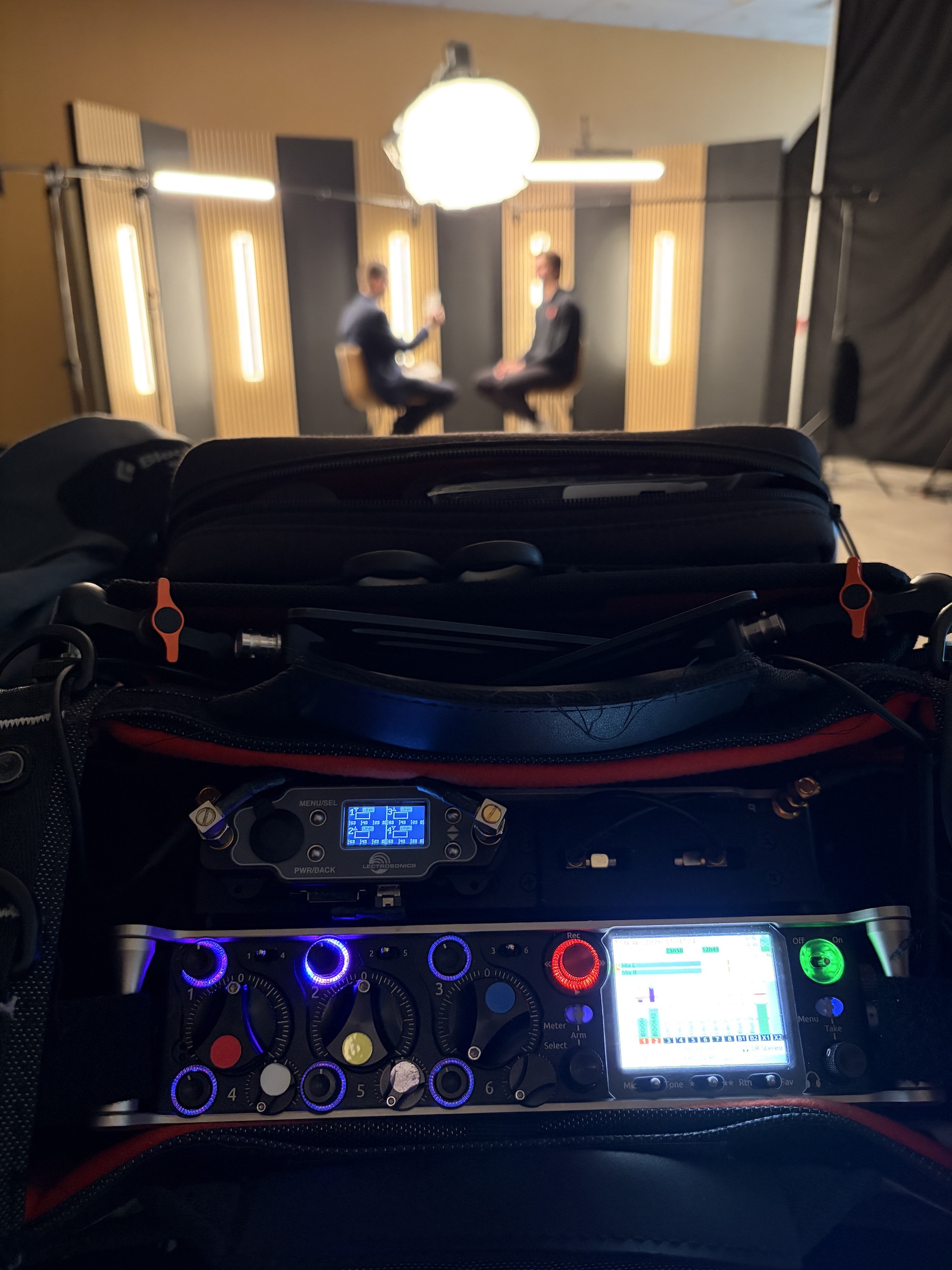 Professional sound cart setup with mixer, wireless receivers, and timecode gear